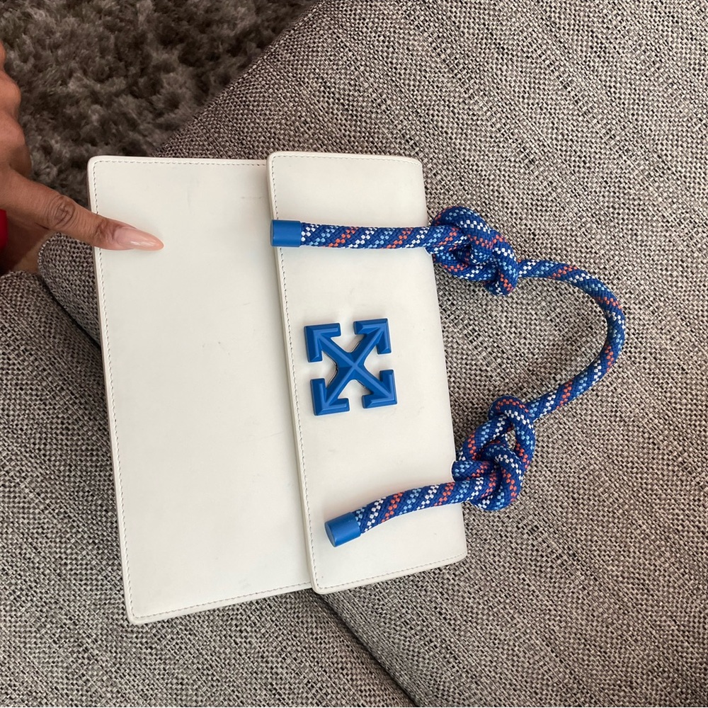 Off white bag in excellent condition. Comes with box